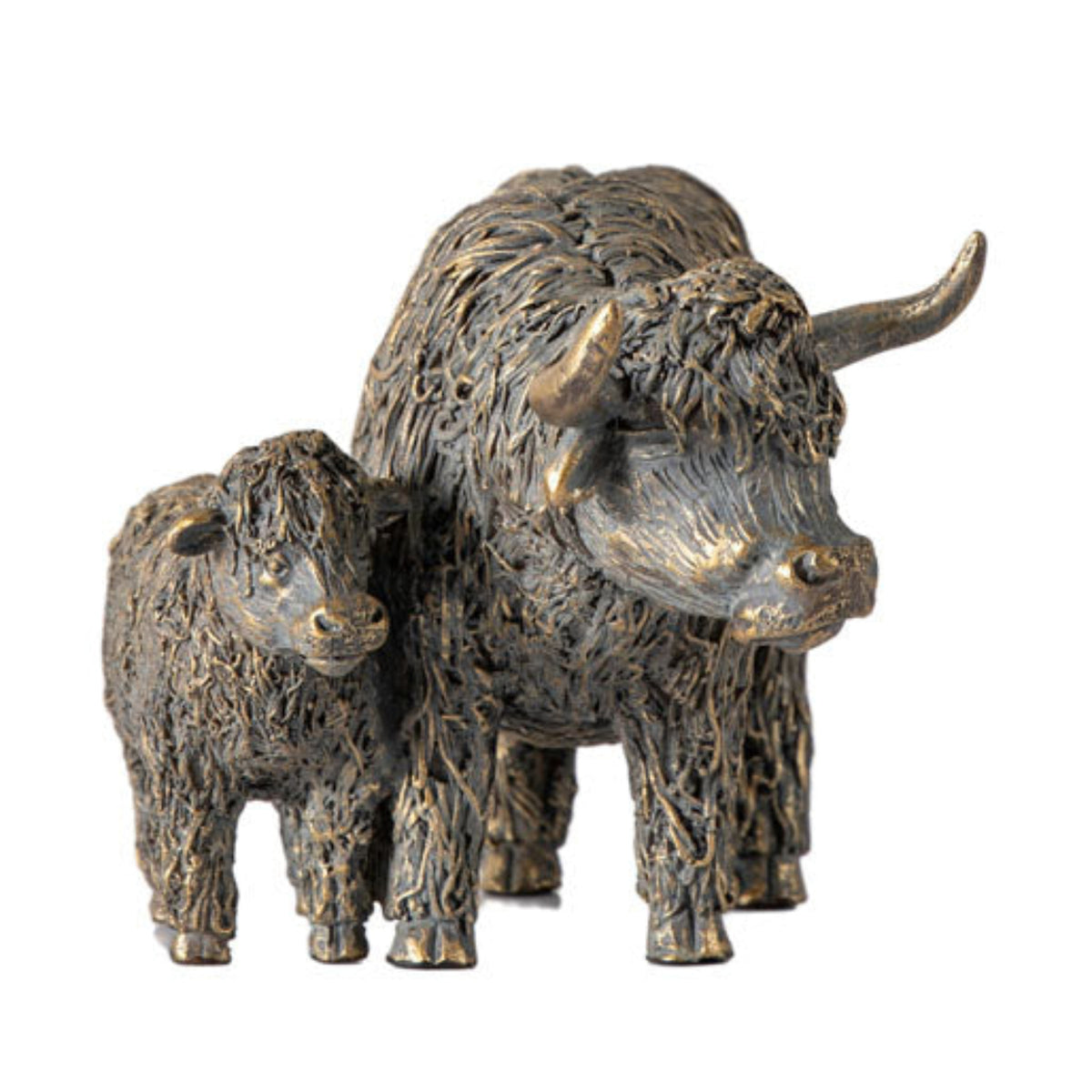 Bronze sculpture of a bull and cow on a white background
