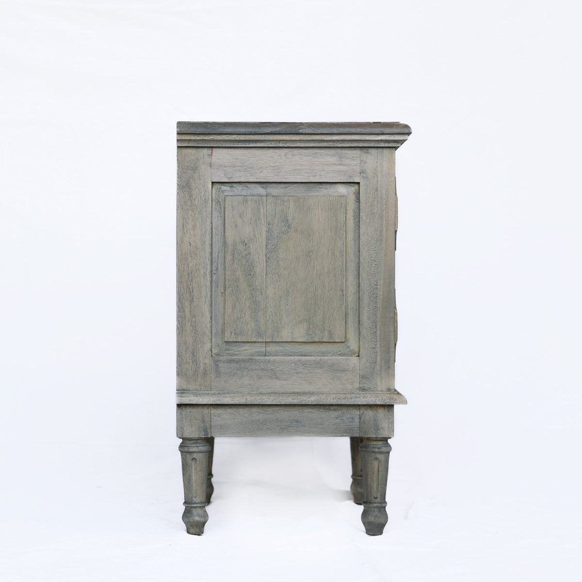 A rustic gray wooden cabinet with a distressed finish, featuring a central panel door and turned legs, photographed against a plain white background.