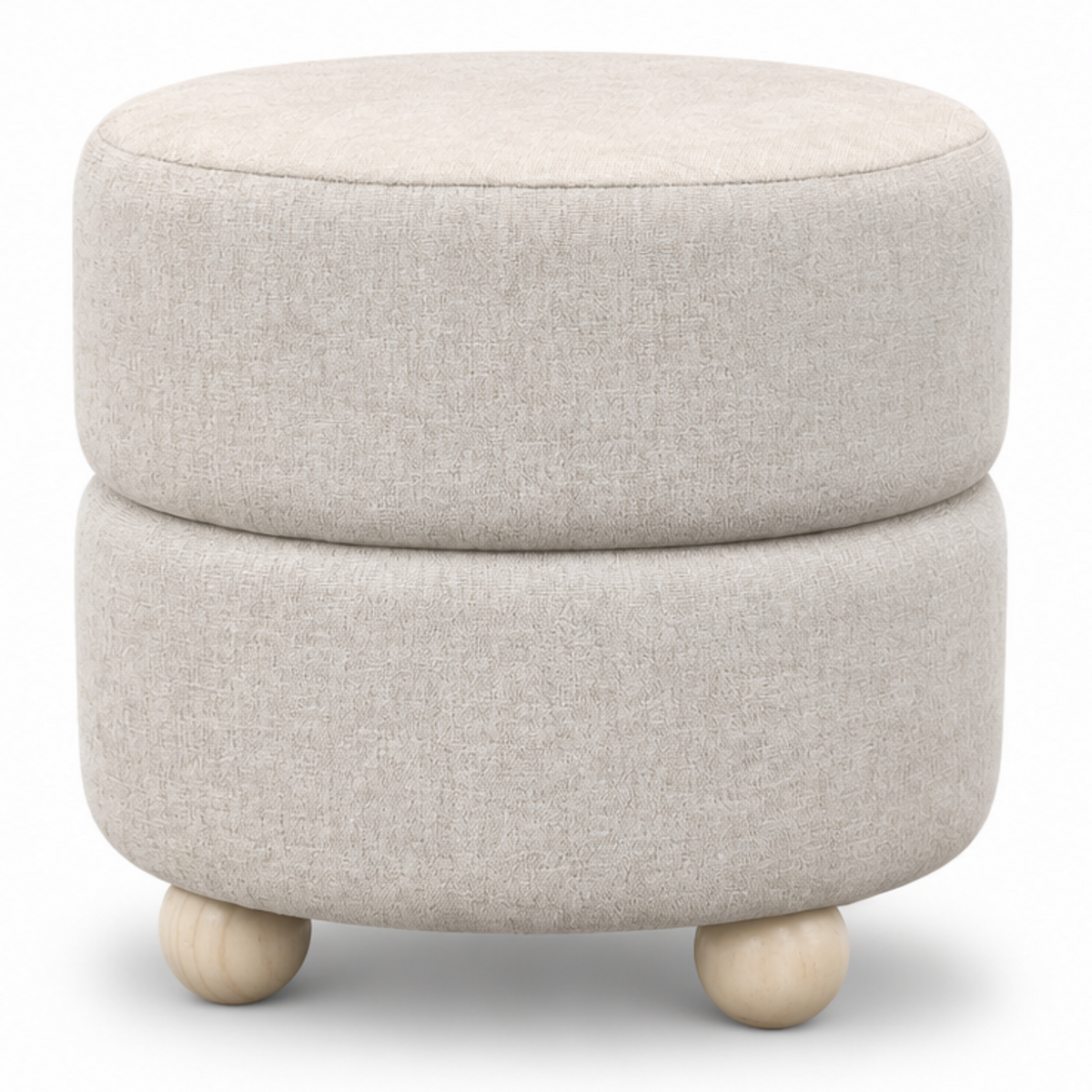 A round upholstered ottoman with two stacked cushioned tiers and small wooden feet, shown in a split view: on the left in a styled room setting next to a chair and side table, and on the right on a clean white background.