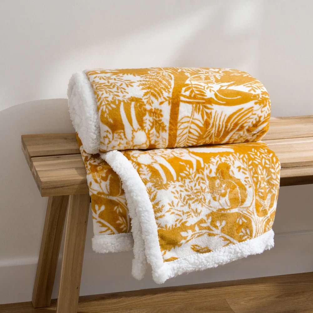 furn (Riva Home) Throw furn. Winter Woods Fleece Throw in Ochre