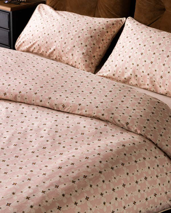 TRANSLUCENT DAISY PIPED DUVET COVER SET PINK  by Rockett St George.