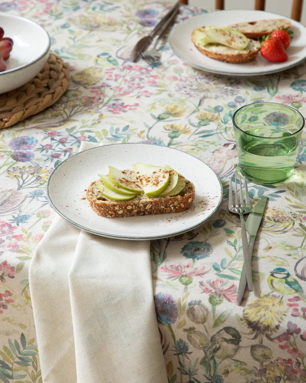 MORNING CHORUS PRINTED RESIN OIL CLOTH FABRIC (BY THE METRE) NATURAL  by Voyage Maison