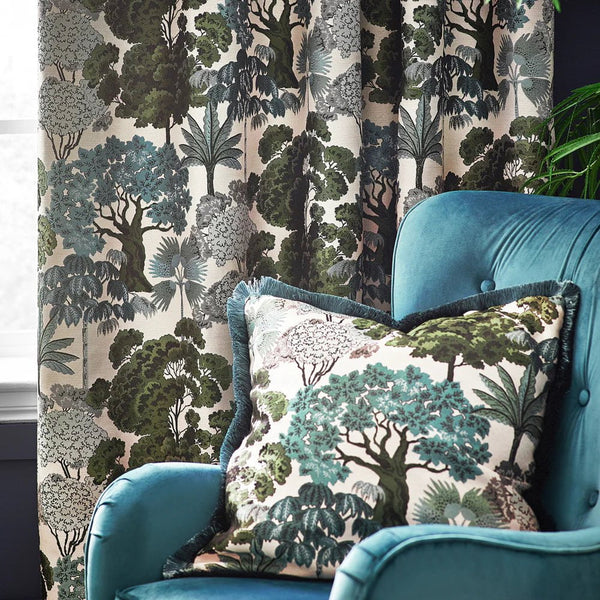 WOODLANDS ROOM DARKENING EYELET CURTAINS IN GREEN by Wylder